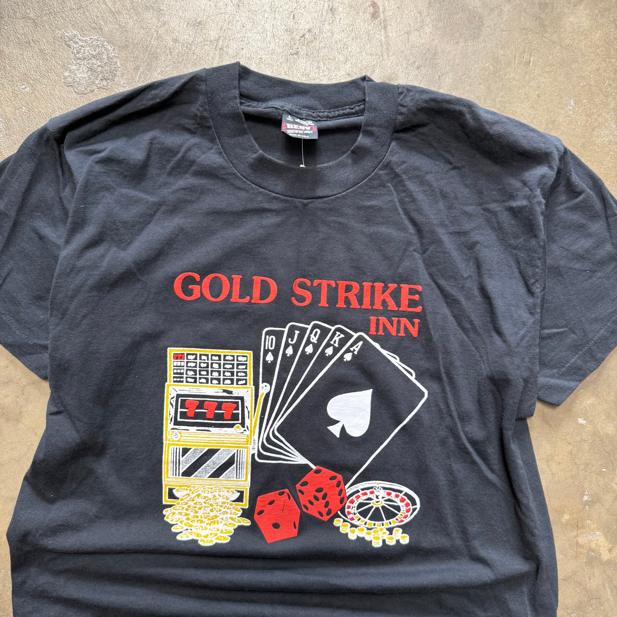 Size large - Vintage Gold Strike inn Casino tee