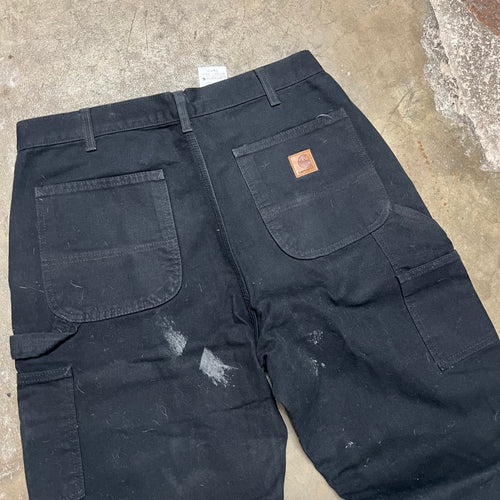 size 34x34 - Vintage Carhartt Fleeced lined Black paint splatter work jeans