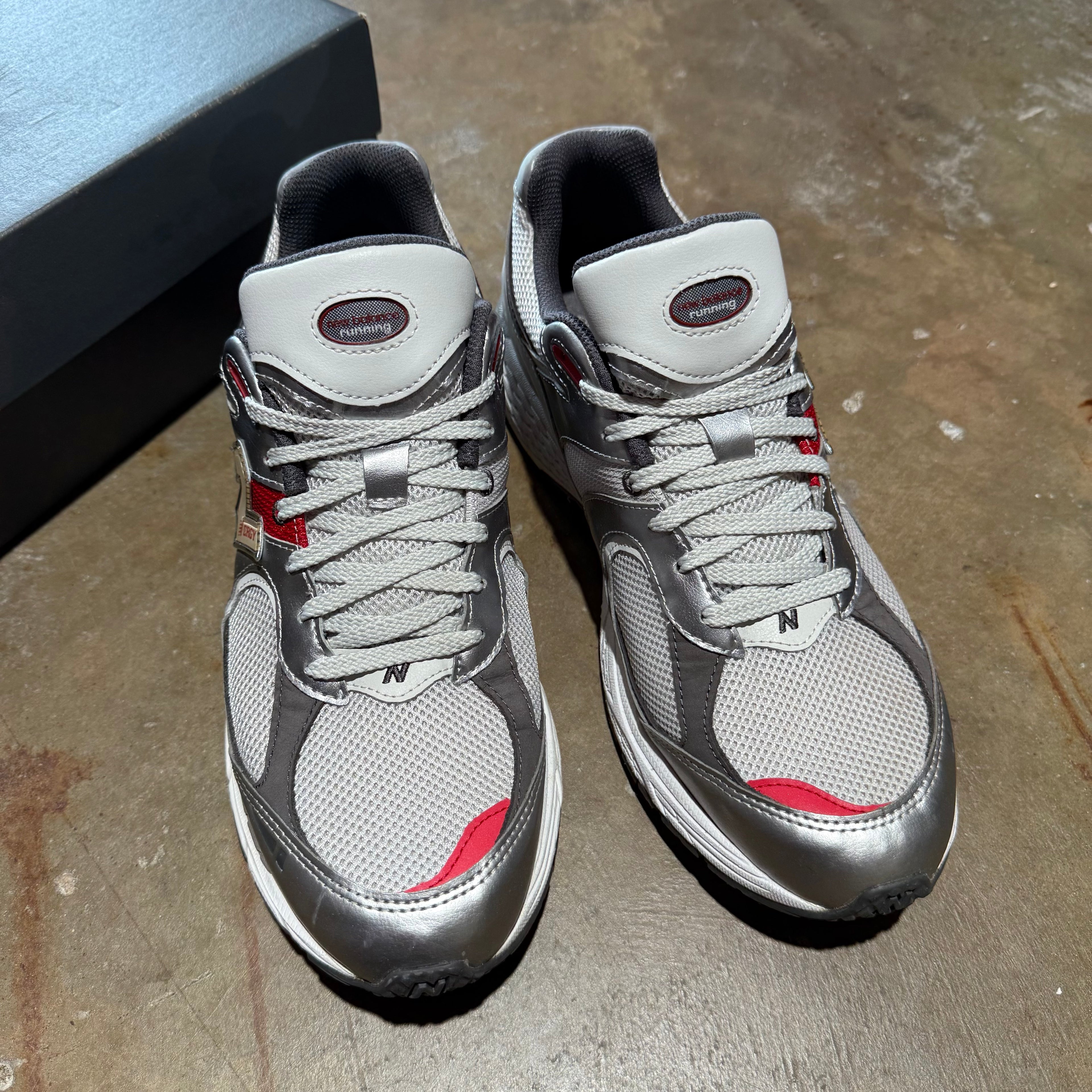 size 12 -New Balance 2002R ' Silver Metallic Bullet Team Red '